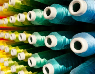 Pacific Textiles melhora o tempo de resposta em 96% com o Rimini Support™ para SAP